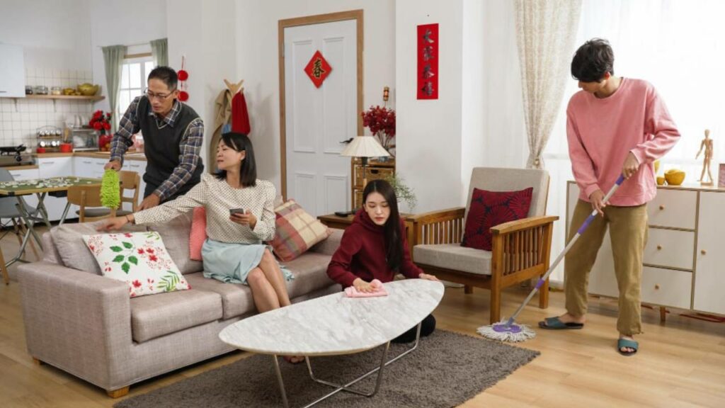 Chinese Family doing House Cleaning before Chinese New Year celebration